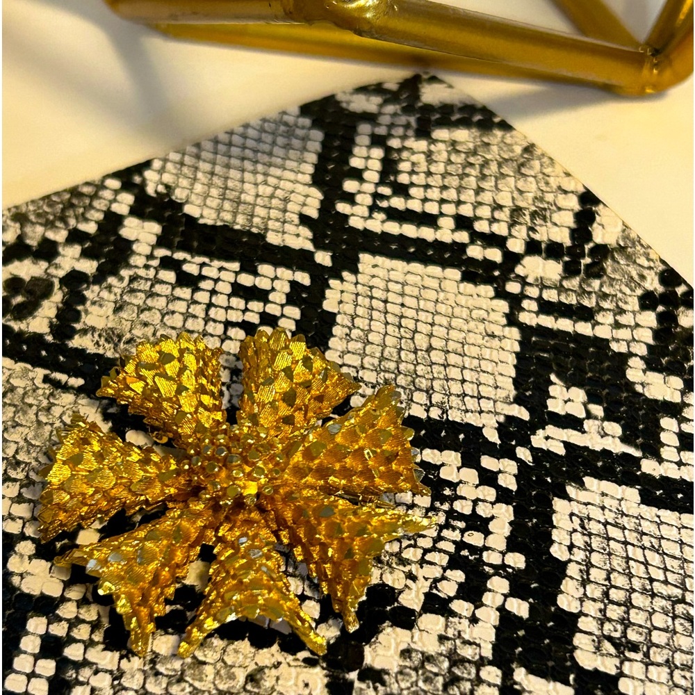 Signed BSK Metal Floral Burst Brooch